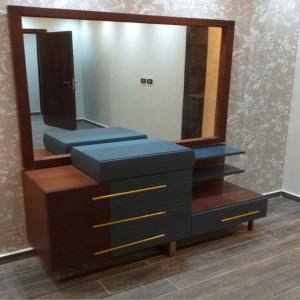 Modern Wooden Dresser with Gold Handles and Mirror