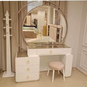 Modern White Vanity Dresser with Circular Mirror and Gold Accents