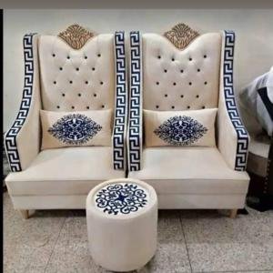 Elegant Dual-Seat High-Back Chair with Blue Patterned Detailing