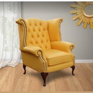 Classic Yellow Leather High-Back Chair with Tufted Design