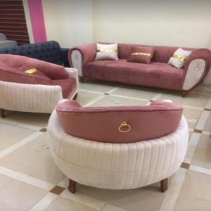 Elegant Pink and Cream Sofa Set with Golden Accents