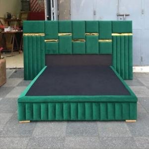 Luxurious Green Velvet Bed with Golden Accents