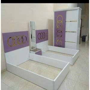 Purple and White Bedroom Set with Decorative Circle Design